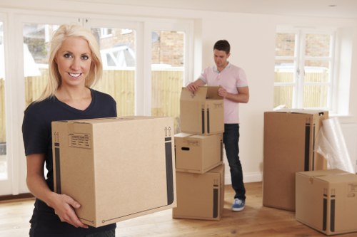 Professional movers handling compact furniture removals in Morden