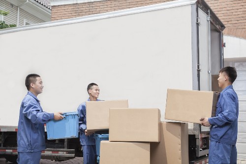 Packed boxes and furniture prepared for removals and storage in Morden
