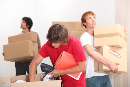 Boxes and household items prepared for small removals in Morden
