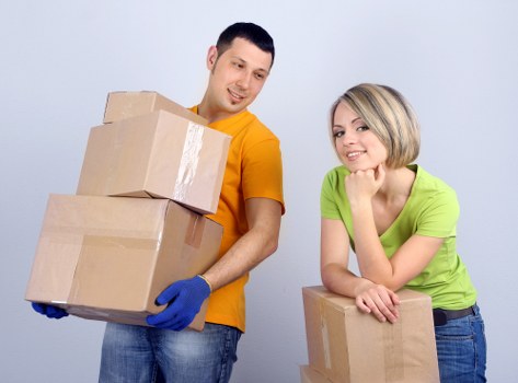 Moving team loading household items for a local removal