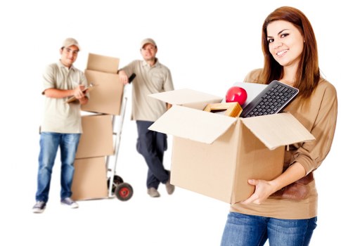 Well-arranged storage unit with wrapped furniture and boxes