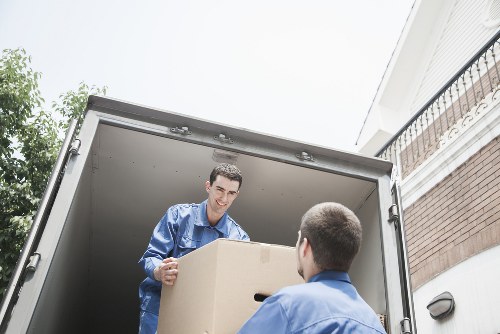 Packed boxes and furniture ready for storage near Morden